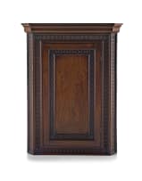 A Regency mahogany corner cupboard