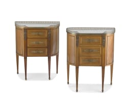 A pair of Louis XV style mahogany, fruitwood-veneered, brass-mounted and marble-topped commodes, late 19th/early 20th century