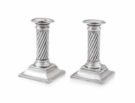 A pair of Victorian silver candlesticks, maker's marks worn, London, 1894