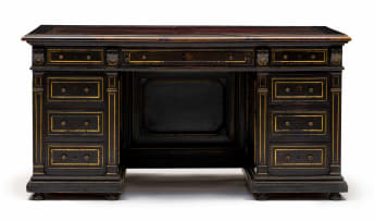 A Victorian ebonized and gilt pedestal desk