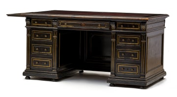 A Victorian ebonized and gilt pedestal desk