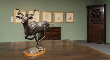 A green and black-painted and metal-mounted centre table, modern