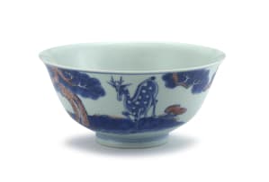 A Chinese underglaze-blue and copper-red glazed bowl, Qing Dynasty, 19th century