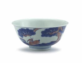 A Chinese underglaze-blue and copper-red glazed bowl, Qing Dynasty, 19th century