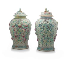 A near pair of Chinese famille-verte jars and covers, 20th century