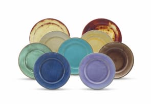 An assembled set of seven Linn Ware glazed dinner plates