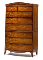 A George III figured mahogany bowfronted tallboy/chest-on-chest