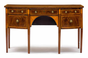 A George III inlaid and mahogany bowfronted sideboard