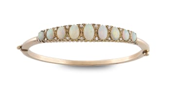 Opal and diamond gold bangle