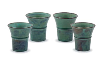 Four Linn Ware green-glazed beakers