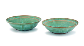 A pair of Linn Ware speckled sea green-glazed bowls