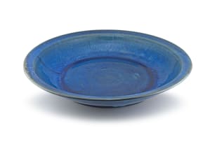 A large Linn Ware blue-glazed dish