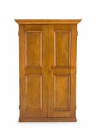 A pine and fruitwood cupboard, 20th century