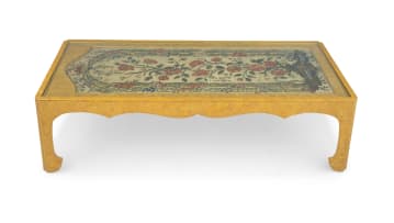 A painted and gilt occasional table