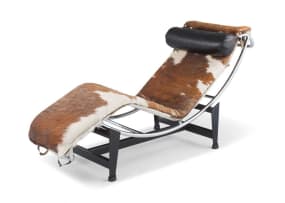 An LC4 chrome and cowhide upholstered chaise longue designed in 1928 by Le Corbusier, Pierre Jeanneret and Charlotte Perriand, 1980s