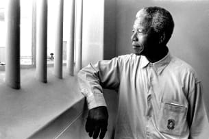 Jürgen Schadeberg; Nelson Mandela in his Cell on Robben Island, 1994