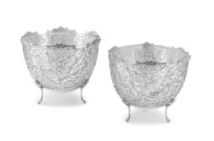A pair of Dutch silver pierced and engraved baskets with import marks for Chester, 1904, retailed by SBL, .925 sterling