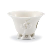 A Chinese blanc-de-chine libation cup, Qing Dynasty, Qianlong period, 18th century