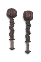 A pair of heavy Chinese lacquered wooden clubs, Qing Dynasty, late 19th century