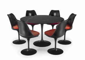 A set of six black lacquer Tulip chairs, model 151 and a Tulip marquinia marble and black lacquer table designed 1955-56 by Eero Saarinen, later edition