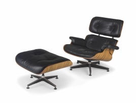 A leather and rosewood-veneered model 670 lounge chair and 671 ottoman designed in 1956 by Charles and Ray Eames, later editions, 1980s