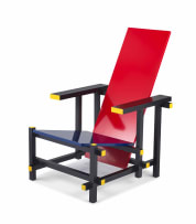 A model 763 red/blue armchair designed in 1923 by Gerrit Rietveld, later edition