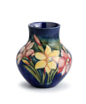 A William Moorcroft leaf-and-berry pattern vase, 1928-1949