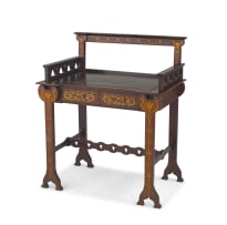 An Art Nouveau mahogany, painted and satinwood inlaid writing table, in the manner of Shaplands & Peters