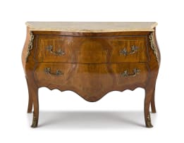 A Louis XV style kingswood, inlaid and marble-topped commode