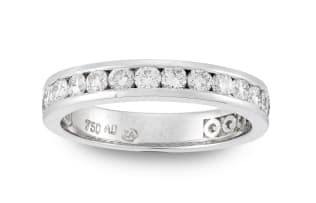 Diamond and 18ct white gold half eternity ring