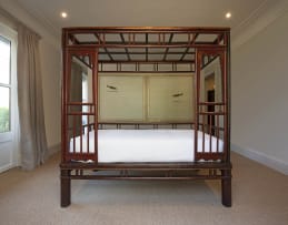 A Chinese hardwood bed, late 19th century