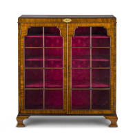 A simulated rosewood, mahogany and walnut-veneered bookcase, Maple & Company, London, early 20th century