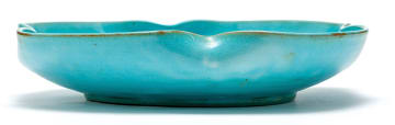 A Linn Ware turquoise-glazed petal-shaped dish