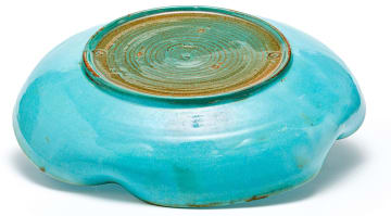 A Linn Ware turquoise-glazed petal-shaped dish