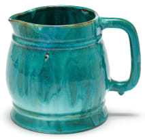 A Ceramic Studio green-glazed jug