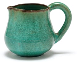 A Linn Ware mottled green-glazed jug