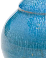 A Linn Ware stippled blue-glazed condiment pourer