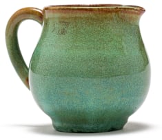 A Linn Ware green-glazed tea pot
