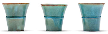 Three Linn Ware blue and russet-glazed beakers