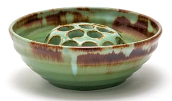 A Linn Ware russet and green-glazed bowl