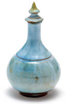A Linn Ware blue-glazed condiment pourer and cover