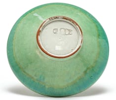 A Globe green-glazed bowl