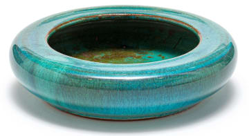 A Globe green-glazed bowl