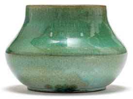 A Globe green-glazed vase