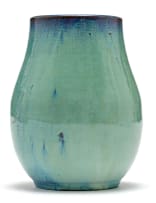 A South African ceramic mottled green and indigo-glazed vase