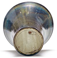 A Globe iridescent blue, brown and cream-glazed vase