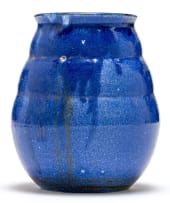 A South African ceramic dark blue-glazed vase