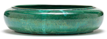 A Globe iridescent green-glazed bowl
