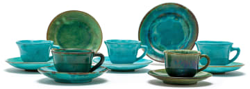 Four Linn Ware tea cups and saucers