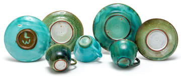 Four Linn Ware tea cups and saucers